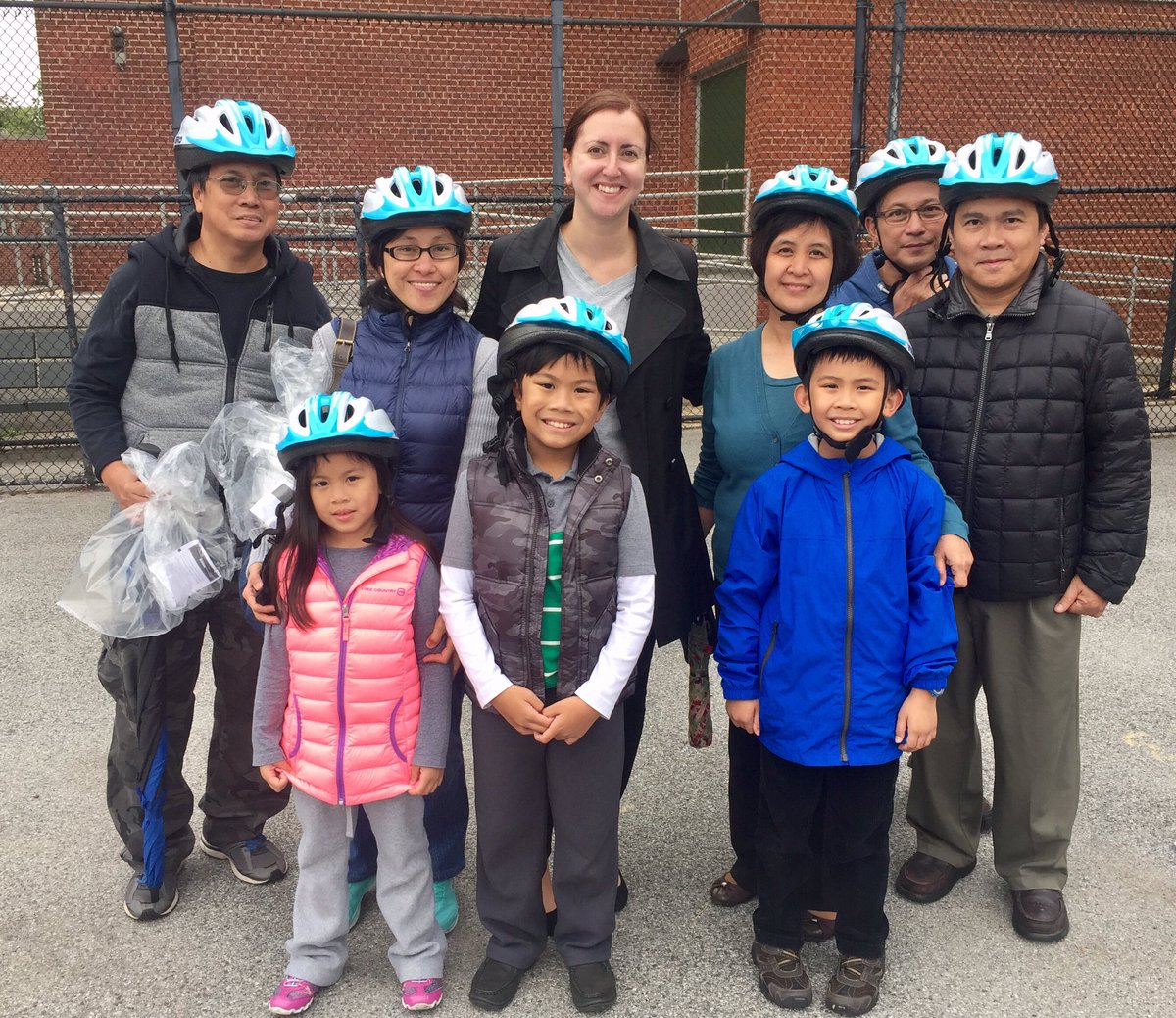 2016-10-03-rozic-grodenchik-partner-with-nycdot-for-bike-helmet-giveaway