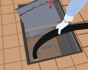 grease trap being cleaned in NYC